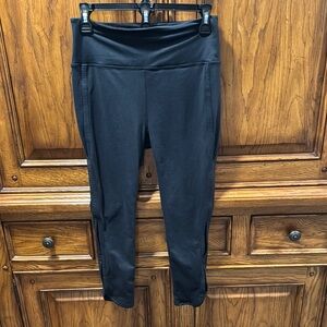 FP Movement Black Leggings size medium side slit detail NWOT